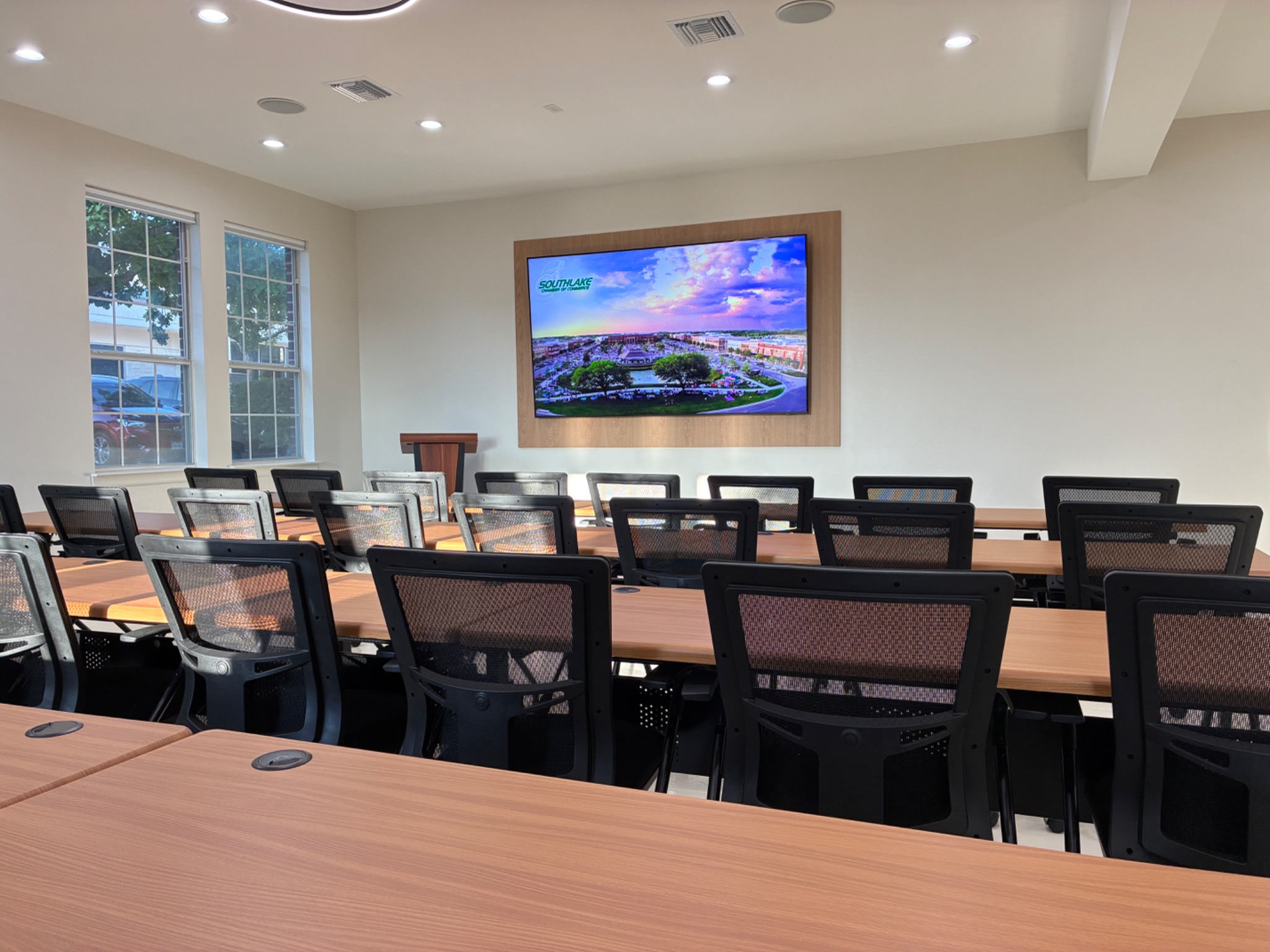 Southlake Chamber Commons meeting room with presentation display and classroom seating